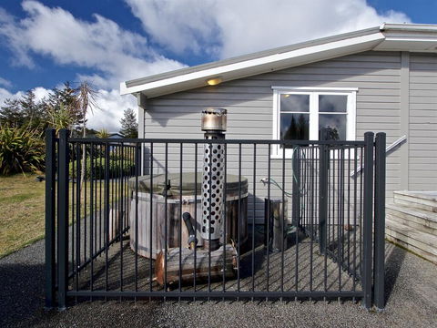 Hot Tub Haven - National Park Holiday Home - Accommodation New Zealand 0