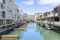 Luxury Living on Waterfront with large sunny deck by Urban Butler